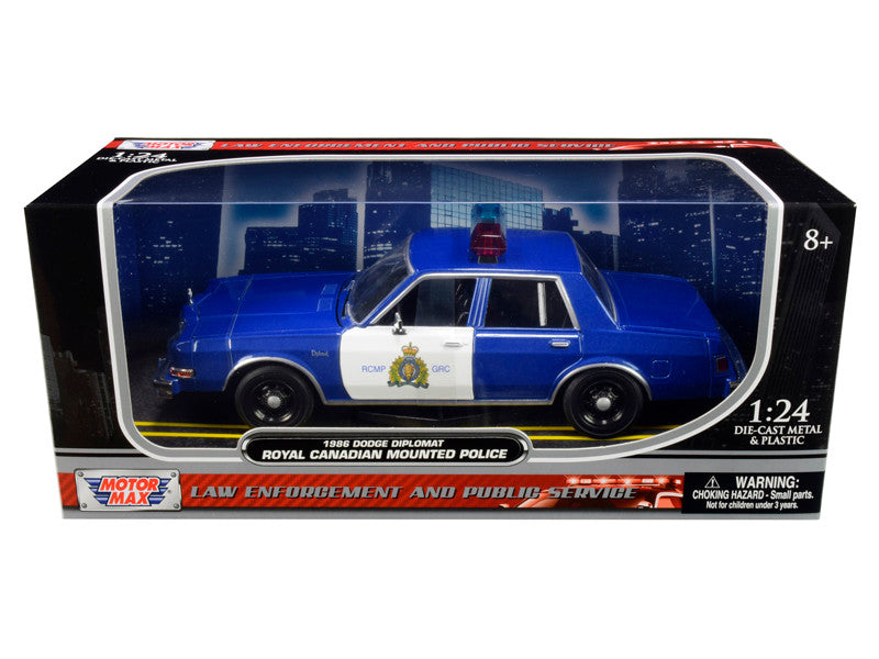 1986 Dodge Diplomat "Royal Canadian Mounted Police" Metallic Blue and White 1/24 Diecast Model Car by Motormax-0