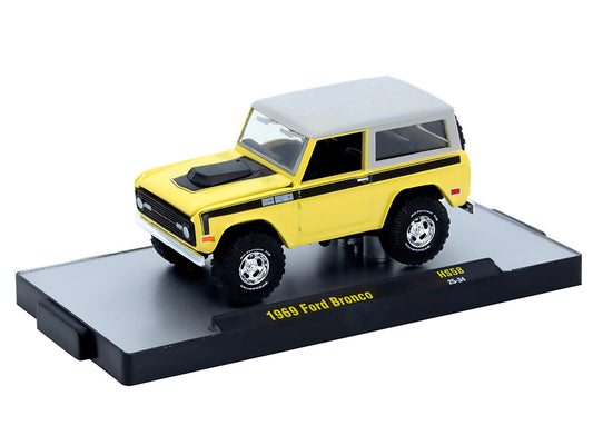 1969 Ford Bronco Yellow with Black Stripes and Gray Top Limited Edition to 6380 pieces Worldwide 1/64 Diecast Model Car by M2 Machines-0