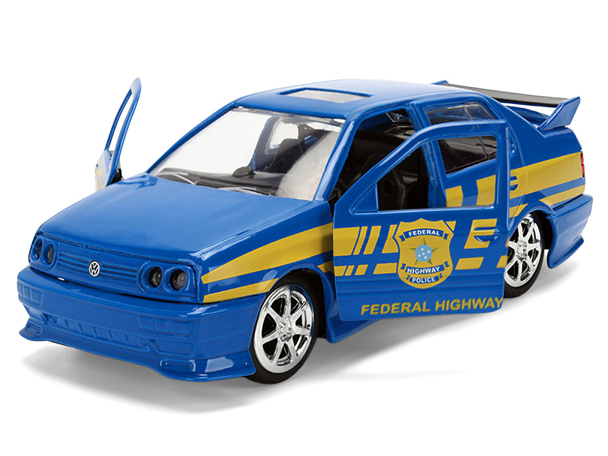 Volkswagen Jetta Police Vehicle "Rio Federal Highway Police" Blue with Yellow Stripes "Fast Five" (2011) Movie "Fast & Furious" Series 1/32 Diecast Model Car by Jada-3