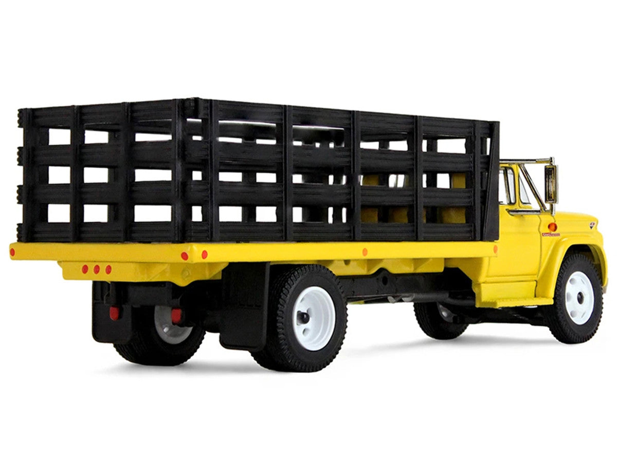 GMC 4000 Stake Truck Bright Yellow 1/64 Diecast Model by DCP/First Gear-1