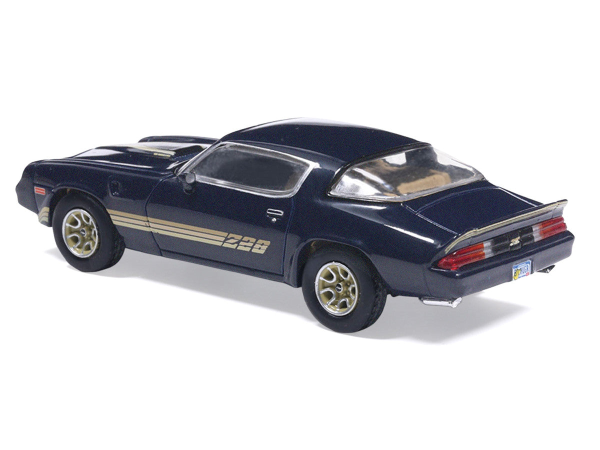 1981 Chevrolet Camaro Z28 Dark Blue Metallic with Gold Stripes and Interior 1/64 Diecast Model Car by IXO Models-1