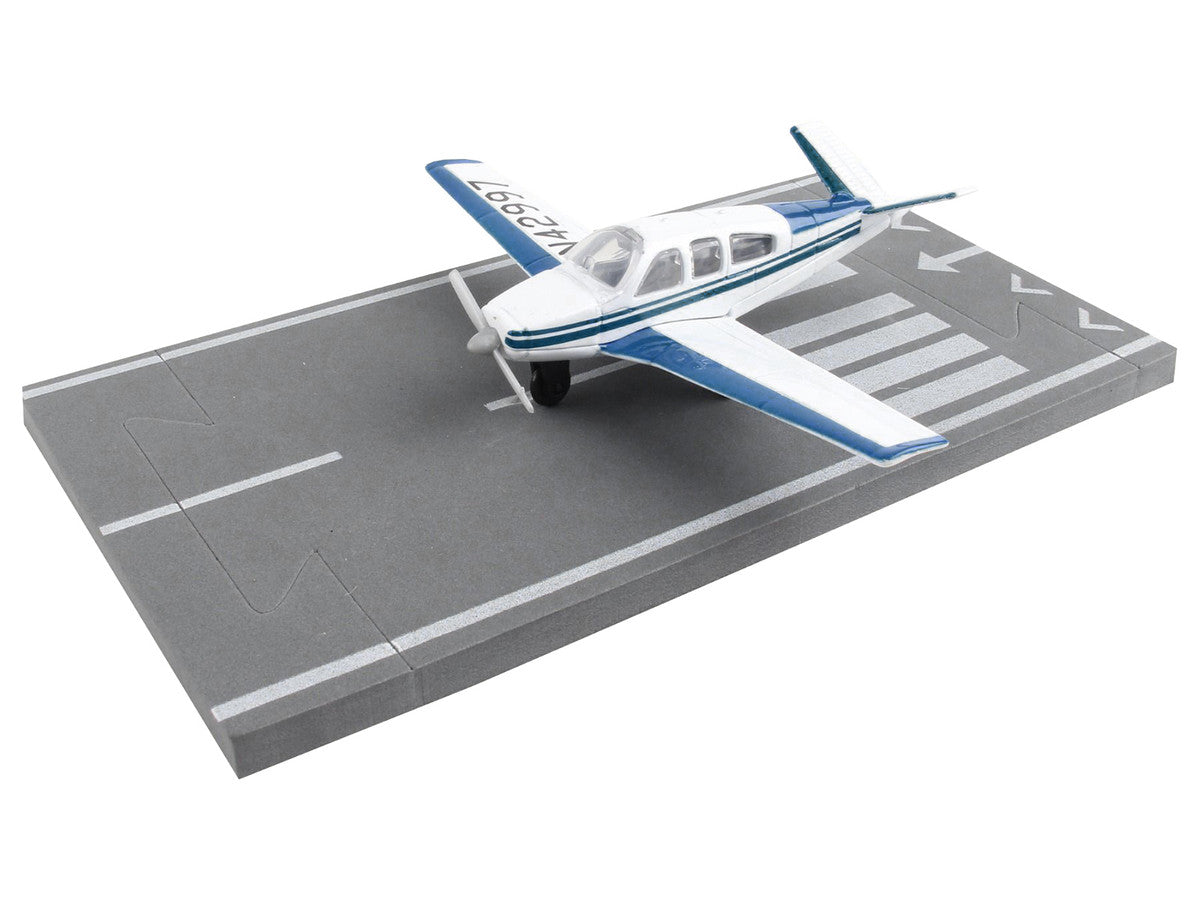 Beechcraft Bonanza Aircraft White with Blue Stripes "N42997" with Runway Section Diecast Model Airplane by Runway24-2