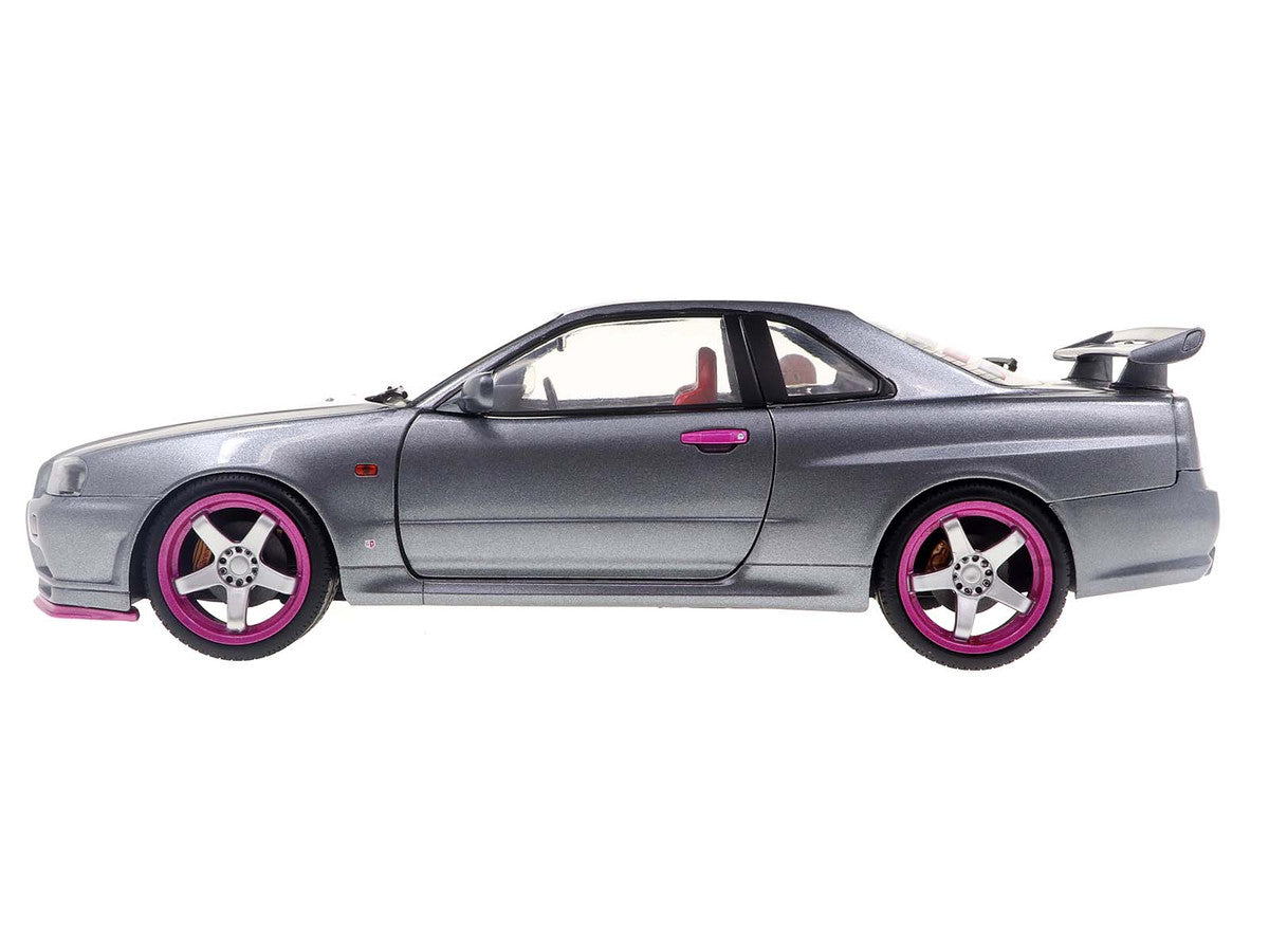 1999 Nissan Skyline GT-R (R34) RHD (Right Hand Drive) Silver Metallic with Purple Wheels 1/18 Diecast Model Car by Solido-1