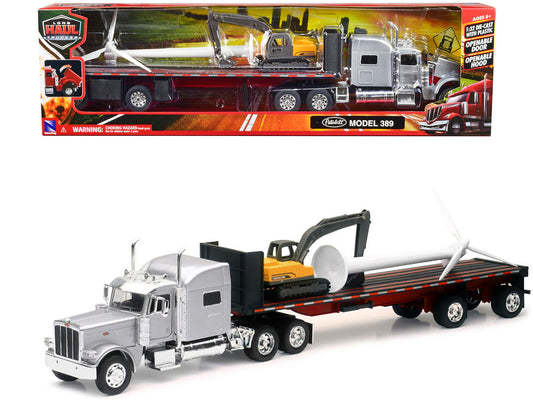 Peterbilt 389 Truck with Flatbed Trailer Silver Metallic with Excavator and Wind Turbine "Long Haul Truckers" Series 1/32 Diecast Model by New Ray-0